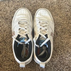 Nike Lows, basketball styled shoes. Creased and worn